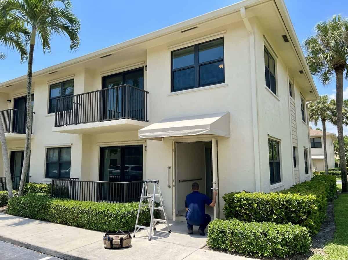 Fitting a bathroom grab bar at a updated 55 plus condominium in West Delray Beach, FL