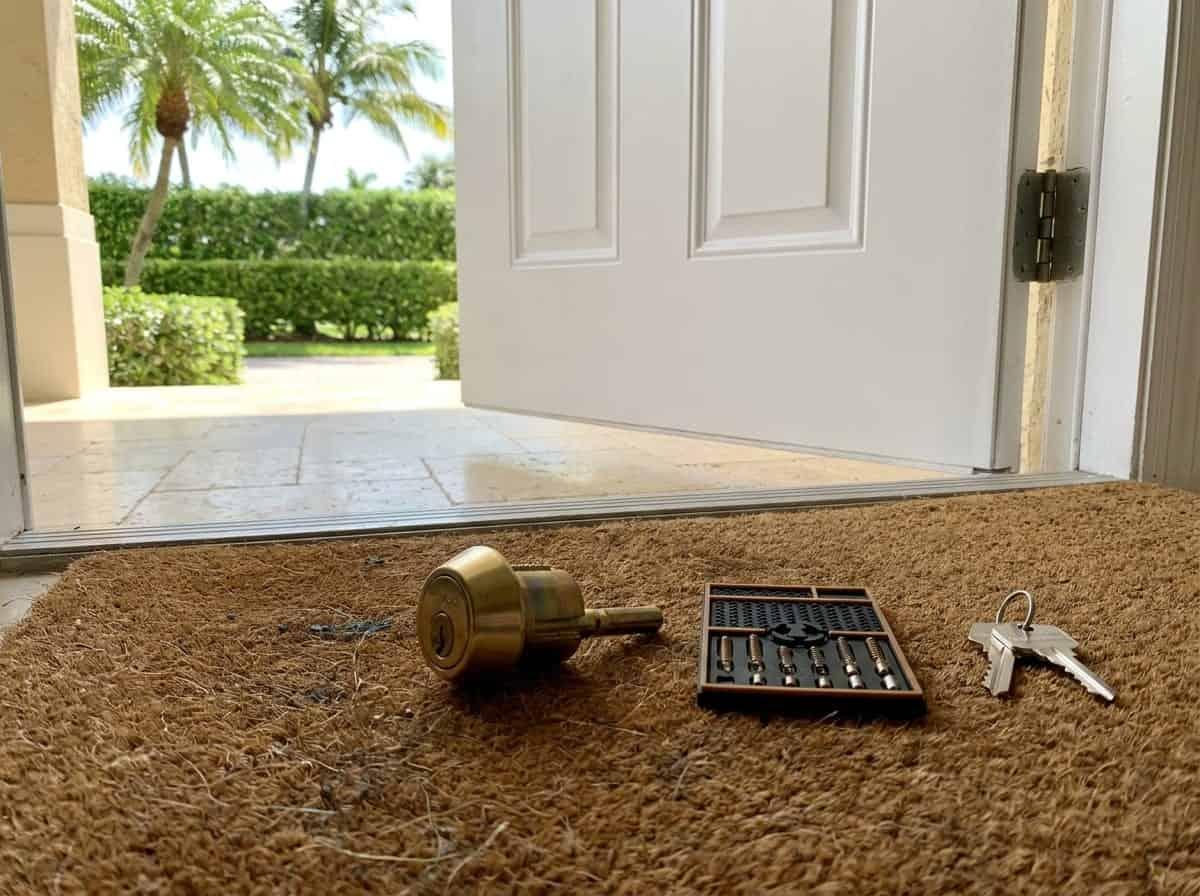 Deadbolt cylinder being rekeyed at a home entry in Palm Beach County, FL