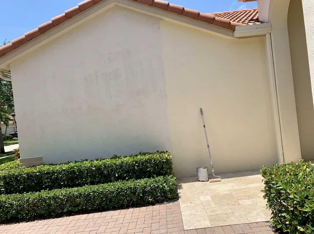Faded and freshly repainted stucco on a home in Palm Beach County, FL