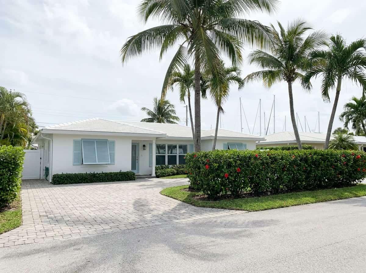 Updated island house on a narrow street in Palm Beach Shores, FL